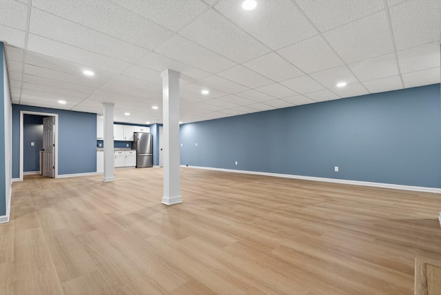115 Annabelle Way, Ashland City, TN 37015 - finished below grade area featuring freestanding refrigerator, light wood-style floors, a paneled ceiling, and recessed lighting