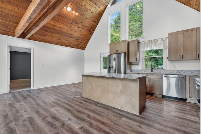 115 Annabelle Way, Ashland City, TN 37015 - kitchen with stainless steel appliances, a wooden ceiling with exposed beams, high vaulted ceiling, a center island, and light stone counters