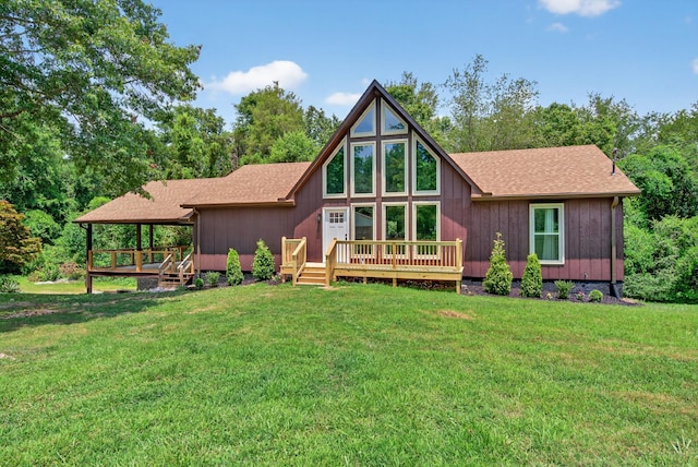 115 Annabelle Way, Ashland City, TN 37015 - back of property with a deck, a shingled roof, and a yard