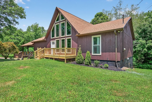115 Annabelle Way, Ashland City, TN 37015 - back of property featuring a wooden deck, a lawn, and roof with shingles