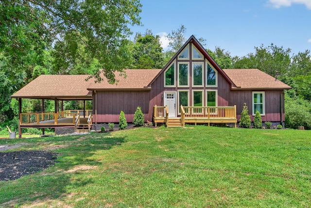 115 Annabelle Way, Ashland City, TN 37015 - rear view of property featuring a shingled roof, a wooden deck, and a yard
