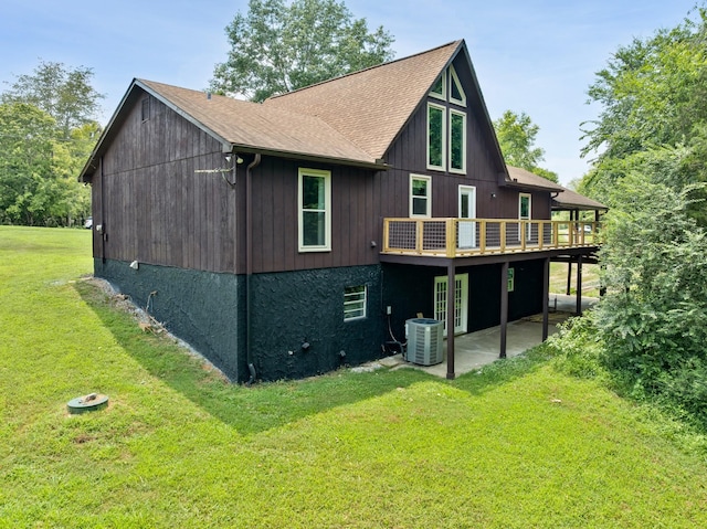 115 Annabelle Way, Ashland City, TN 37015 - rear view of property featuring a wooden deck, a patio area, a lawn, and roof with shingles
