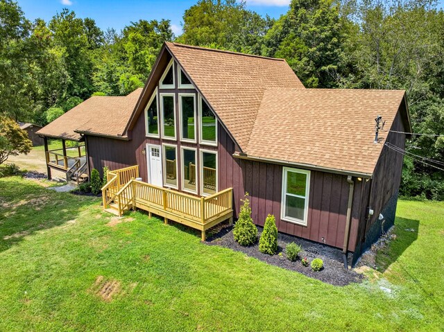 115 Annabelle Way, Ashland City, TN 37015 - back of property with roof with shingles, a lawn, and a deck