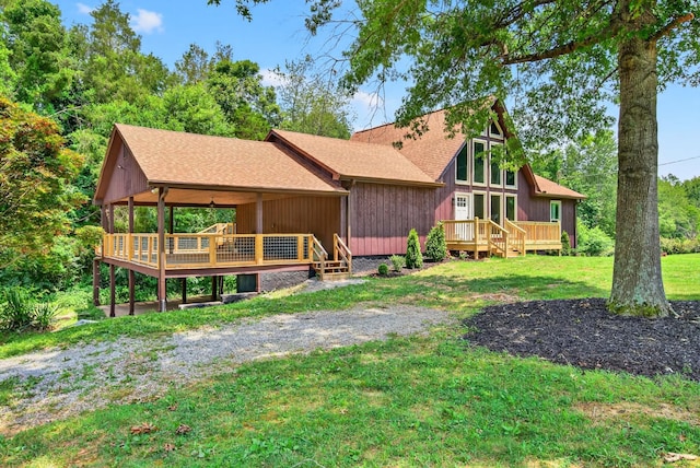 115 Annabelle Way, Ashland City, TN 37015 - back of house featuring a deck, a yard, and roof with shingles