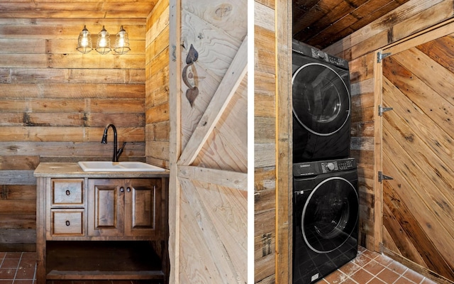 36 Still Hollow Rd, Menlo, GA 30731 - laundry area featuring estacked washer and dryer, wooden ceiling, wooden walls, and tile patterned floors