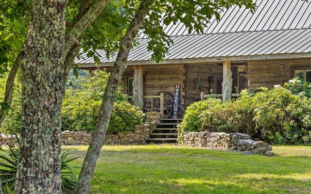 36 Still Hollow Rd, Menlo, GA 30731 - doorway to property with a yard, a metal roof, and covered porch