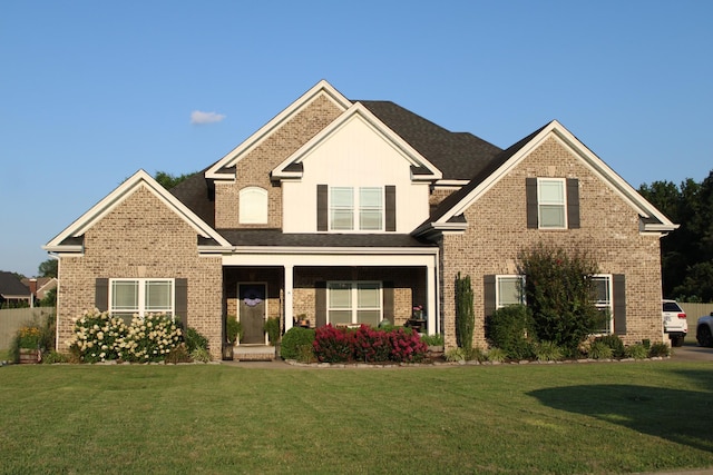 8009 Shelly Plum Dr, Murfreesboro, TN 37128 - craftsman inspired home featuring a front lawn, brick siding, and covered porch
