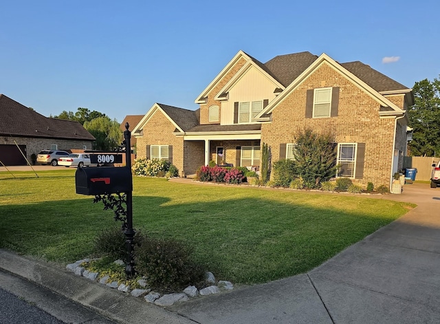 8009 Shelly Plum Dr, Murfreesboro, TN 37128 - view of front of home with a front yard, brick siding, and board and batten siding