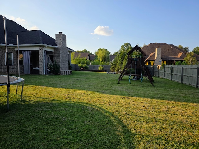 8009 Shelly Plum Dr, Murfreesboro, TN 37128 - fenced backyard featuring a trampoline and a playground