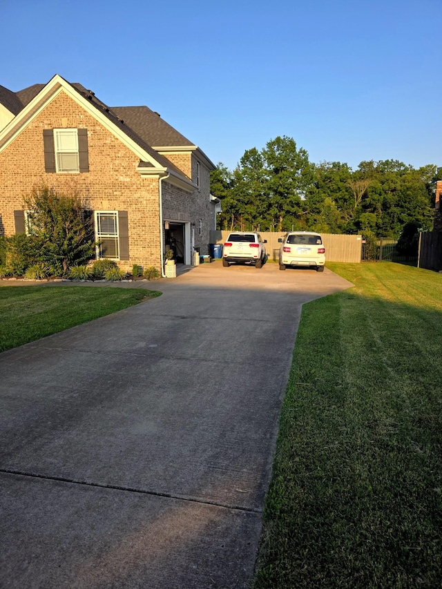 8009 Shelly Plum Dr, Murfreesboro, TN 37128 - view of property exterior with concrete driveway and brick siding