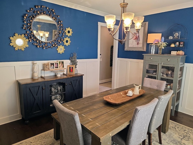 8009 Shelly Plum Dr, Murfreesboro, TN 37128 - dining area with a chandelier, wainscoting, wood finished floors, and a decorative wall