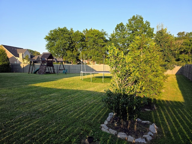 8009 Shelly Plum Dr, Murfreesboro, TN 37128 - fenced backyard with a trampoline and a playground