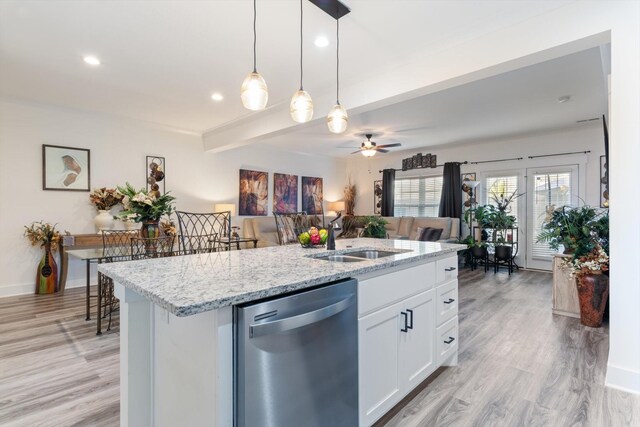 3331 Alta Ln, Murfreesboro, TN 37128 - kitchen featuring stainless steel dishwasher, light wood-style flooring, ceiling fan, pendant lighting, and a center island with sink