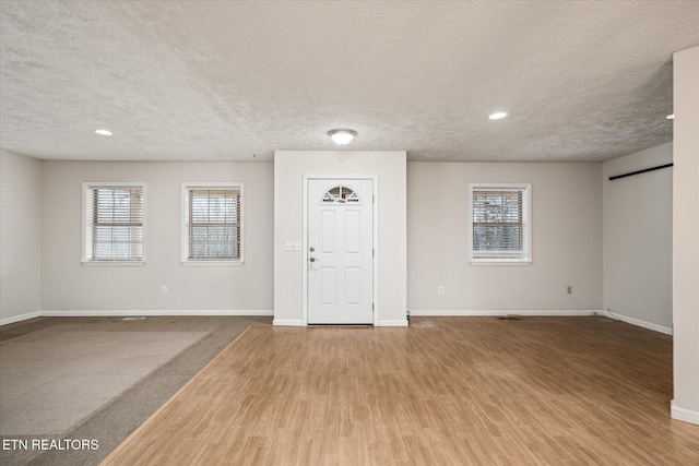 708 Poston Dr, Monterey, TN 38574 - foyer with a textured ceiling, wood finished floors, plenty of natural light, and recessed lighting