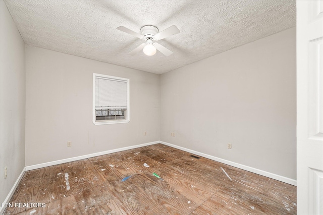 708 Poston Dr, Monterey, TN 38574 - spare room with ceiling fan, a textured ceiling, and wood finished floors