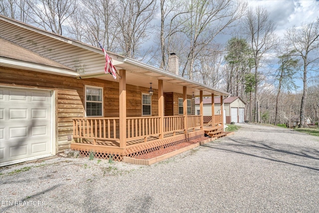 708 Poston Dr, Monterey, TN 38574 - view of side of property with a porch and a chimney