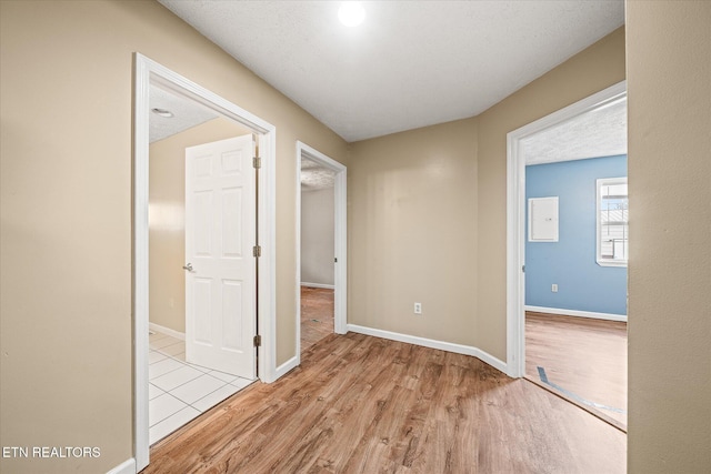 708 Poston Dr, Monterey, TN 38574 - corridor featuring wood finished floors and baseboards