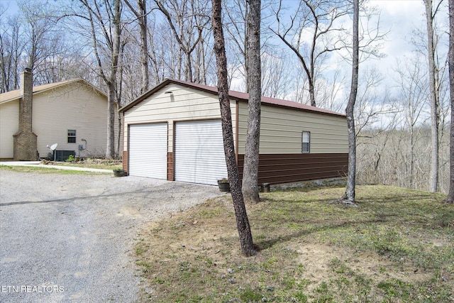 708 Poston Dr, Monterey, TN 38574 - detached garage featuring driveway