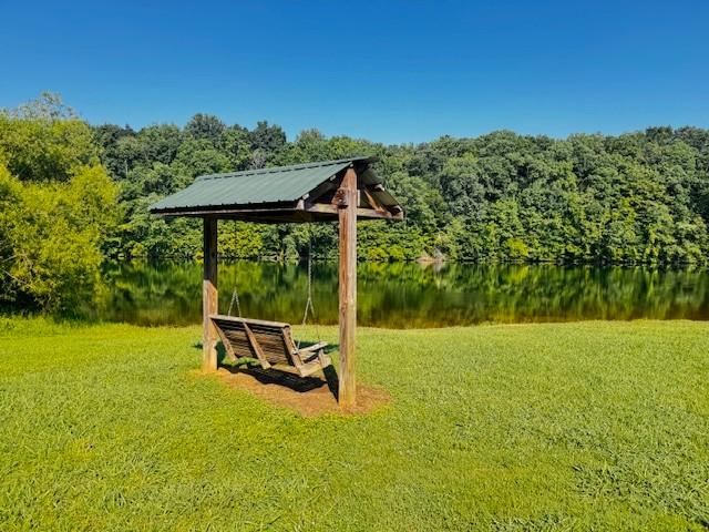 112 Plain View Dr, Estill Springs, TN 37330 - view of green lawn with a water view and a view of trees
