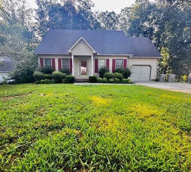 112 Plain View Dr, Estill Springs, TN 37330 - view of front of home with an attached garage, a front yard, and concrete driveway