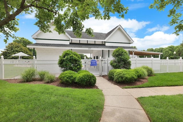 236 Comer Cir, Murfreesboro, TN 37128 - view of front of home with a fenced front yard, roof with shingles, and a gate