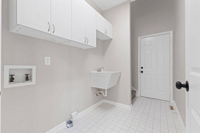 236 Comer Cir, Murfreesboro, TN 37128 - washroom with cabinet space, washer hookup, and light tile patterned floors