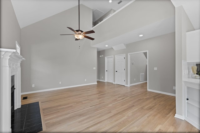236 Comer Cir, Murfreesboro, TN 37128 - unfurnished living room featuring high vaulted ceiling, ceiling fan, a fireplace with flush hearth, light wood-type flooring, and recessed lighting