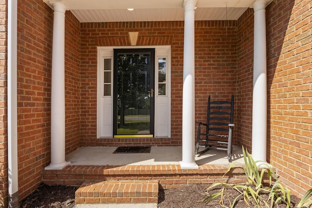 236 Comer Cir, Murfreesboro, TN 37128 - doorway to property featuring covered porch and brick siding