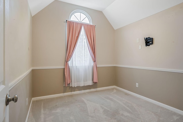 2117 Spring Hill Cir, Spring Hill, TN 37174 - spare room with lofted ceiling and carpet flooring