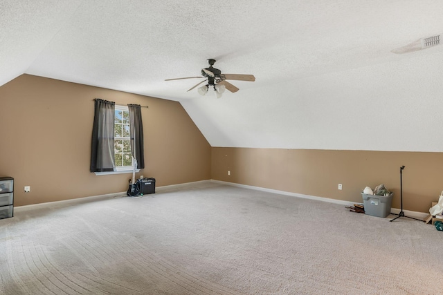 2117 Spring Hill Cir, Spring Hill, TN 37174 - bonus room featuring lofted ceiling, ceiling fan, carpet flooring, and a textured ceiling