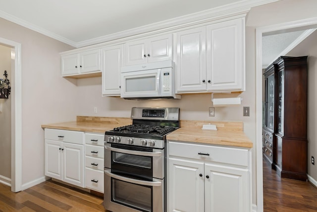 2117 Spring Hill Cir, Spring Hill, TN 37174 - kitchen with white microwave, range with two ovens, dark wood-type flooring, butcher block counters, and ornamental molding