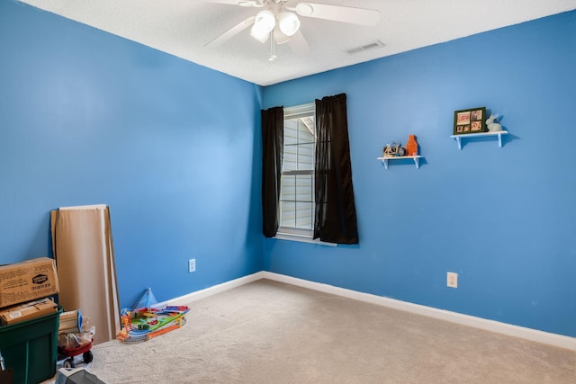 2117 Spring Hill Cir, Spring Hill, TN 37174 - rec room featuring carpet flooring, a ceiling fan, and a textured ceiling
