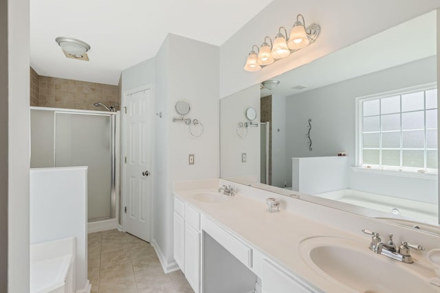 2117 Spring Hill Cir, Spring Hill, TN 37174 - bathroom featuring a stall shower, a bath, and double vanity