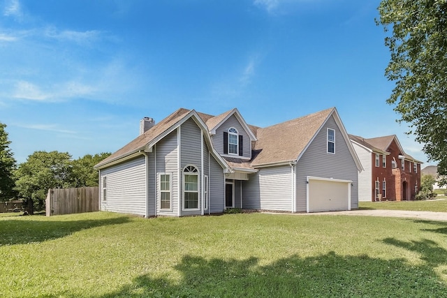 2117 Spring Hill Cir, Spring Hill, TN 37174 - traditional home featuring a chimney, an attached garage, driveway, and a shingled roof