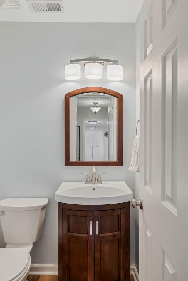 2117 Spring Hill Cir, Spring Hill, TN 37174 - half bathroom featuring vanity and wood finished floors