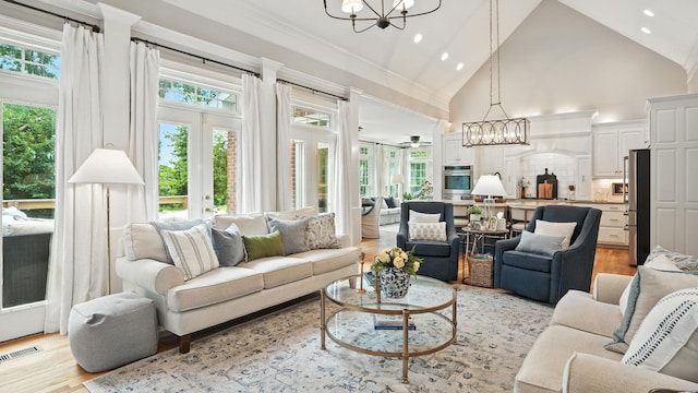 529 Derby Downs, Lebanon, TN 37087 - living area with a chandelier, high vaulted ceiling, light wood-style floors, and recessed lighting