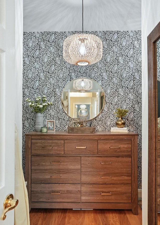 529 Derby Downs, Lebanon, TN 37087 - bathroom with wallpapered walls, vanity, wood finished floors, and a chandelier