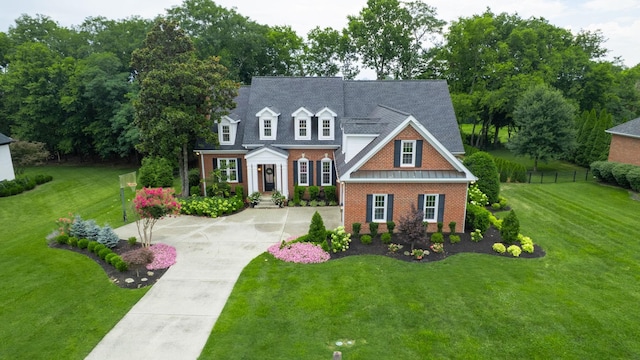 529 Derby Downs, Lebanon, TN 37087 - view of front of house featuring brick siding, a front lawn, driveway, and a shingled roof