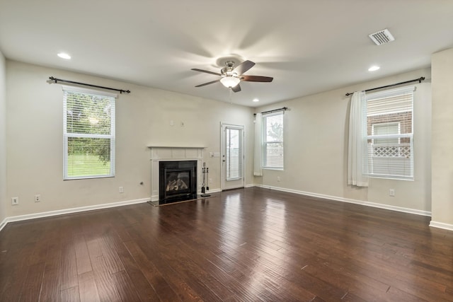 654 Foster Ln, Mount Juliet, TN 37122 - unfurnished living room featuring ceiling fan, a glass covered fireplace, healthy amount of natural light, dark wood-style flooring, and recessed lighting