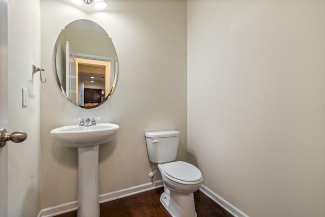 654 Foster Ln, Mount Juliet, TN 37122 - half bathroom with toilet and wood finished floors