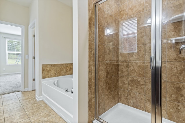 654 Foster Ln, Mount Juliet, TN 37122 - full bathroom featuring a stall shower, a bath, and tile patterned flooring