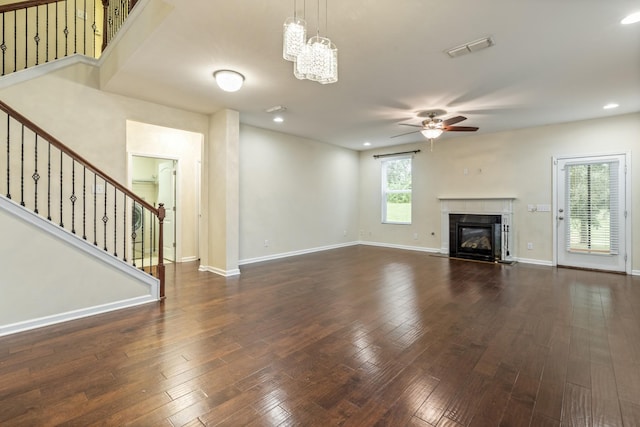 654 Foster Ln, Mount Juliet, TN 37122 - unfurnished living room with ceiling fan, stairway, a tile fireplace, hardwood / wood-style floors, and recessed lighting