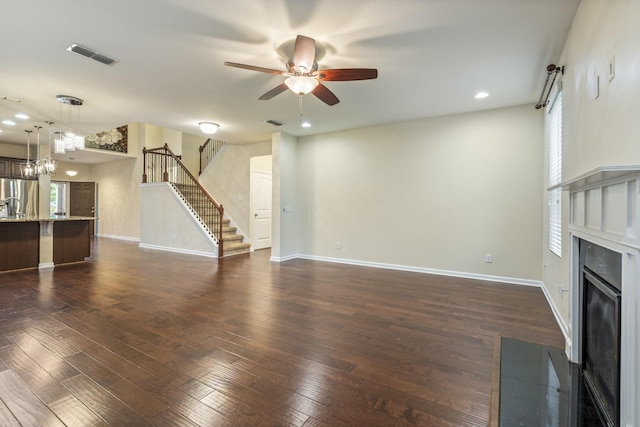 654 Foster Ln, Mount Juliet, TN 37122 - unfurnished living room with a ceiling fan, a fireplace with flush hearth, stairway, dark wood-type flooring, and recessed lighting