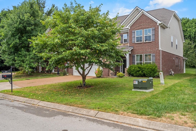 654 Foster Ln, Mount Juliet, TN 37122 - view of front facade with brick siding, concrete driveway, a front yard, and a garage