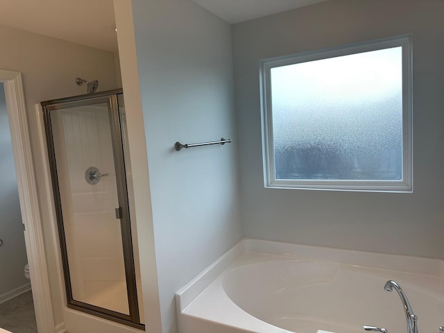 9021 Ada Way, Fairview, TN 37062 - full bathroom with a shower stall and a garden tub