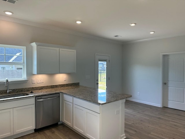 9021 Ada Way, Fairview, TN 37062 - kitchen with stainless steel dishwasher, a peninsula, dark wood-style floors, plenty of natural light, and crown molding