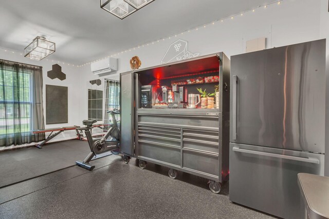 1016 Nealcrest Cir, Spring Hill, TN 37174 - interior space with freestanding refrigerator and a wall unit AC