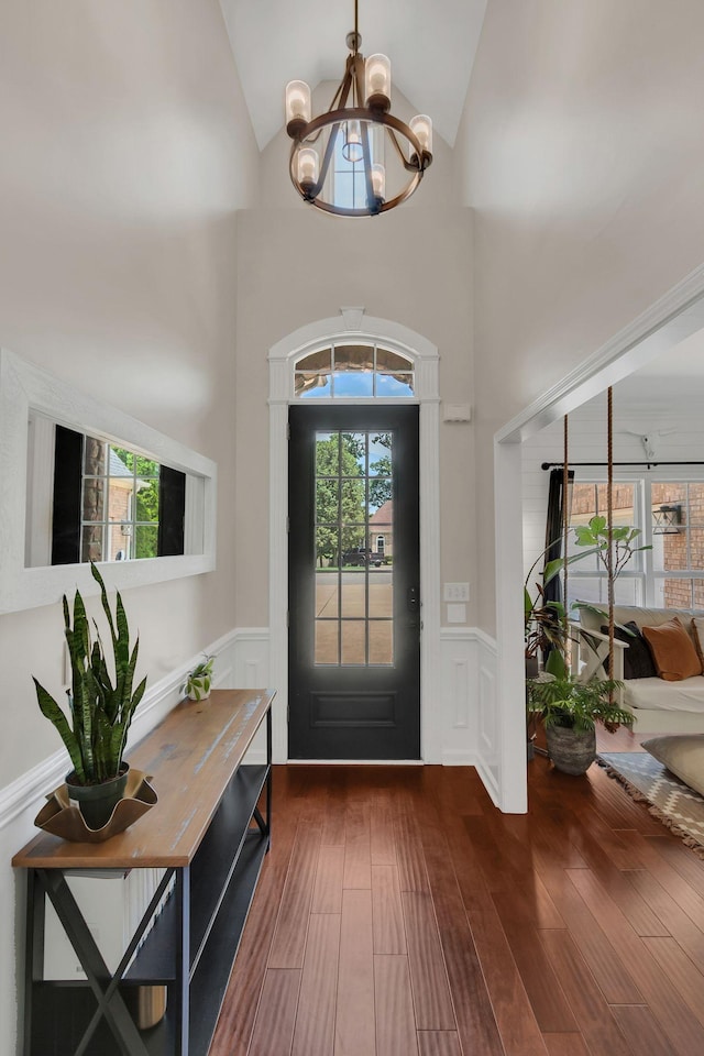 1016 Nealcrest Cir, Spring Hill, TN 37174 - entrance foyer with a chandelier, a wainscoted wall, wood finished floors, plenty of natural light, and lofted ceiling