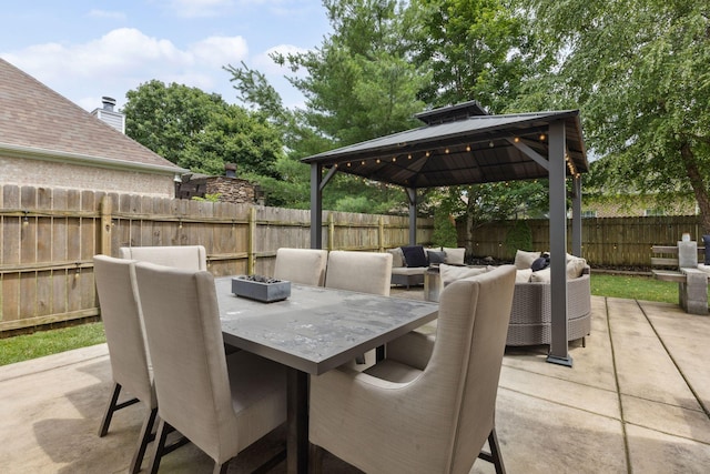 1016 Nealcrest Cir, Spring Hill, TN 37174 - fenced backyard with an outdoor living space, a gazebo, a patio, and outdoor dining area