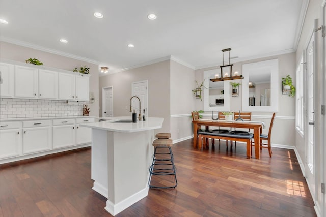 1016 Nealcrest Cir, Spring Hill, TN 37174 - kitchen featuring decorative backsplash, dark wood-type flooring, light countertops, white cabinets, and recessed lighting